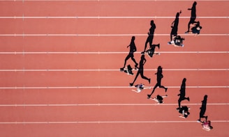 group of people running on stadium
