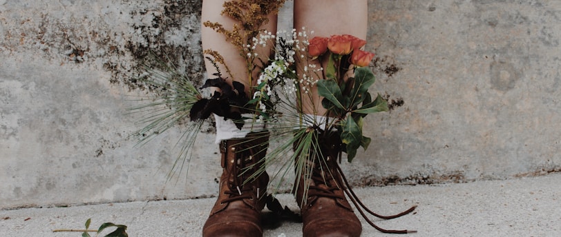 pair of brown leather boots