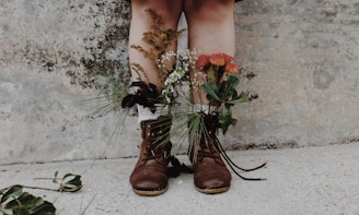 pair of brown leather boots