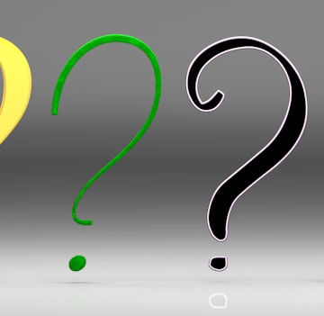 A group of question marks sitting next to each other