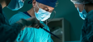 a group of doctors performing surgery in an operating room